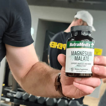 Magnesium Malate - 120 Vegetable Capsules  for energy support used by a man at the gym